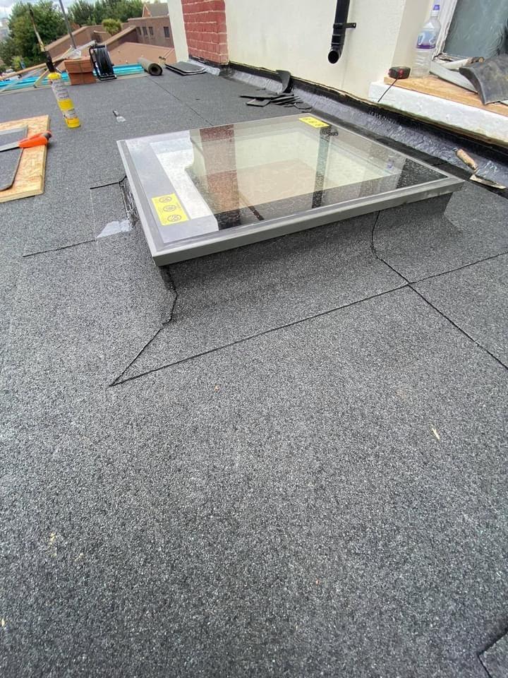 Skylight detail dressed into new felt